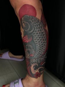 Black & Red Koi Fish Leg Tattoo By Wally At Legendary Tattoos