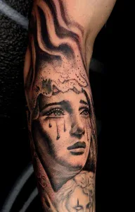 Crying Lady Tattoo by Legendary Tattoos In Las Vegas Nevada.