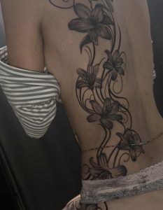 Floral back tattoo by Henry Fuentes at Legendary Tattoos in Las Vegas, Nevada.