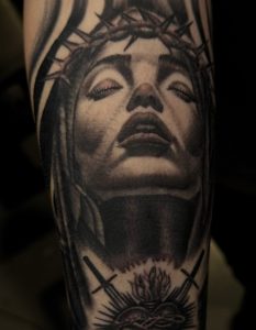 Black and grey portrait tattoo by Henry Fuentes at Legendary Tattoos in Las Vegas, Nevada.