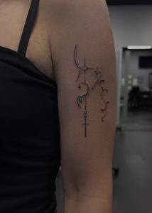 Fine line tattoo