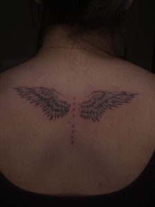 Dainty wings tattoo Las Vegas tattoo
