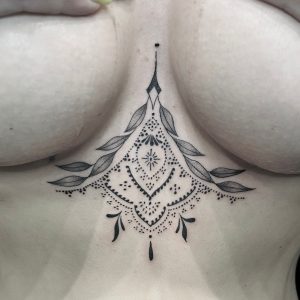 ornamental dainty tattoo